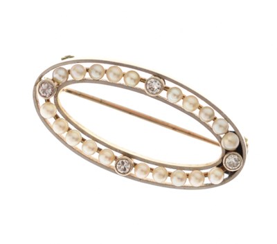 Lot 110 - Seed pearl and diamond yellow metal oval brooch