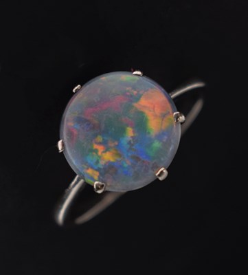 Lot 49 - Black opal doublet platinum ring