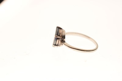 Lot 49 - Black opal doublet platinum ring