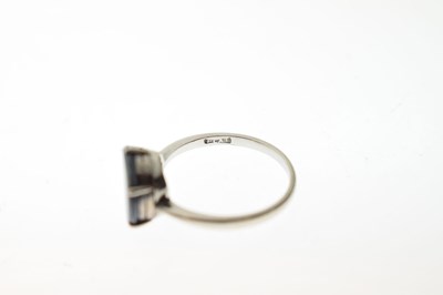 Lot 49 - Black opal doublet platinum ring