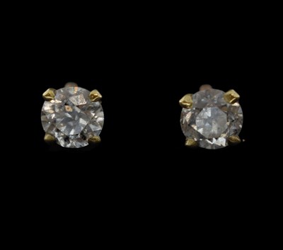 Lot 33 - Pair of diamond solitaire stud earrings