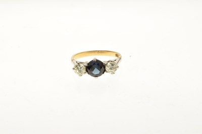 Lot 18 - Sapphire and diamond three-stone ring