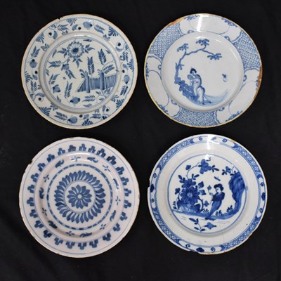 Lot 524 - Four assorted 18th century Dutch Delft and English delftware plates