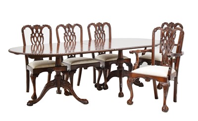 Lot 651 - Reproduction mahogany Chippendale style dining suite