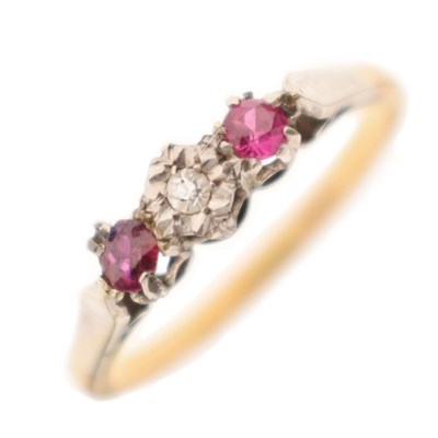 Lot 44 - Illusion set diamond and ruby three-stone ring, stamped '18ct'