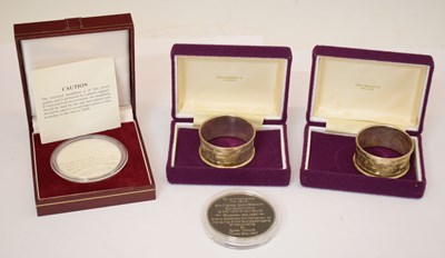 Lot 261 - Two silver medallions, and a pair of Elizabeth II silver napkin rings