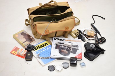 Lot 431 - Collection of Nikon camera lenses, books and accessories