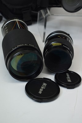 Lot 431 - Collection of Nikon camera lenses, books and accessories