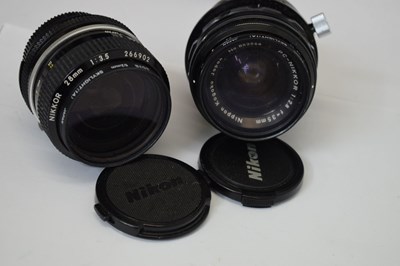 Lot 431 - Collection of Nikon camera lenses, books and accessories