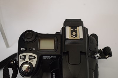 Lot 431 - Collection of Nikon camera lenses, books and accessories