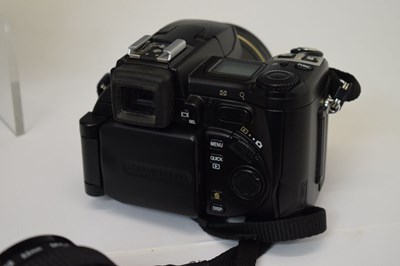 Lot 431 - Collection of Nikon camera lenses, books and accessories