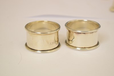 Lot 161 - George V silver toast rack, a set of three Elizabeth II silver decanter labels, etc