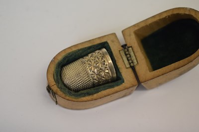 Lot 161 - George V silver toast rack, a set of three Elizabeth II silver decanter labels, etc