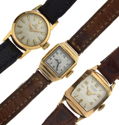 Lot 129 - Omega - Lady's gold plated and stainless steel wristwatch and two 9ct gold cased watches