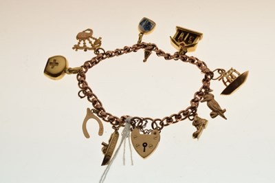 Lot 44 - 9ct rose gold charm bracelet