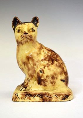 Lot 220 - Staffordshire moulded creamware cat, second half 18th century