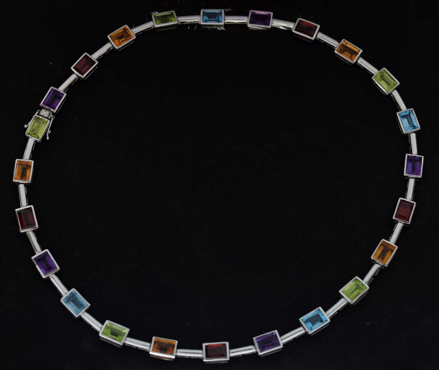 Lot 57 - Multi-gem set 18ct white gold necklace
