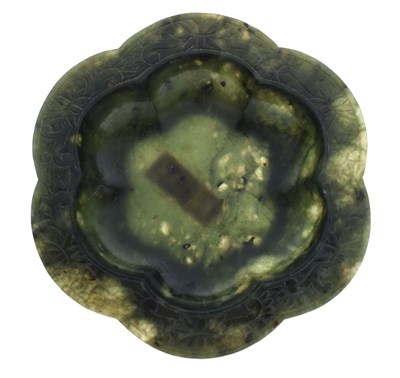 Lot 250 - Chinese carved nephrite ('spinach') jade hexafoil shallow dish