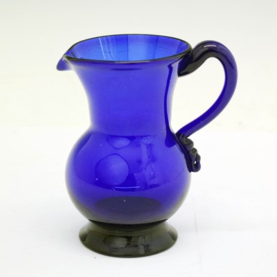 Lot 367 - 'Bristol' blue glass footed baluster cream jug