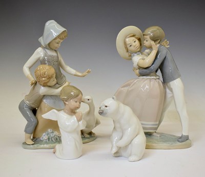 Lot 418 - Lladro - Group of four porcelain figures