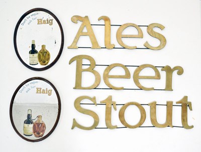 Lot 302 - Three gilt metal 'Beer', 'Stout' and 'Ales' wall-mounted signs and Haig mirrors