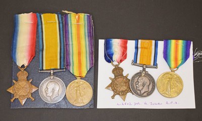 Lot 242 - Two British First World War medal trios