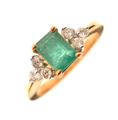 Lot 13 - Emerald and diamond dress ring