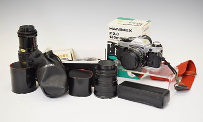 Lot 309 - Canon AE-1 camera, program model, and a quantity of lenses and accessories