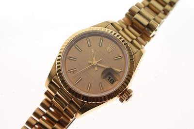 Lot 79 - Rolex - Lady's 18K gold Datejust chronometer bracelet watch, ref. 69178