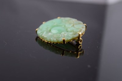 Lot 67 - Carved jade panel brooch