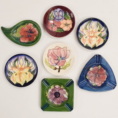 Lot 403 - Moorcroft Pottery - Group of four pin dishes, and three ashtrays