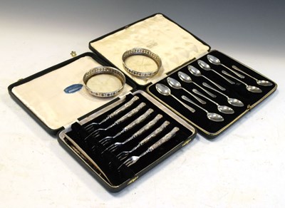 Lot 155 - Cased set of six Elizabeth II silver-handled tea-forks together with