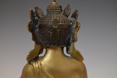 Lot 565 - Himalayan gilt alloy figure of Buddha Shakyamuni
