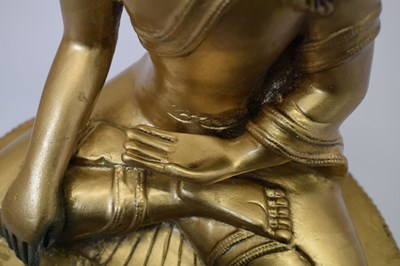 Lot 565 - Himalayan gilt alloy figure of Buddha Shakyamuni