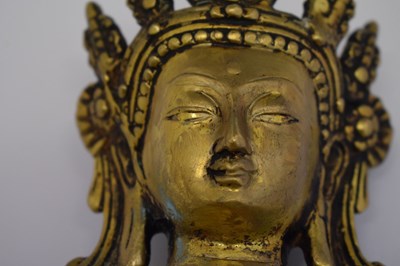 Lot 565 - Himalayan gilt alloy figure of Buddha Shakyamuni