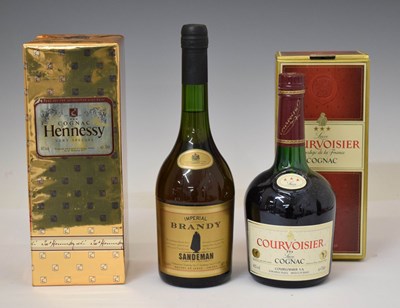 Lot 491 - Hennessey Very Special Cognac, Courvoisier Cognac, and Sandeman Imperial Brandy