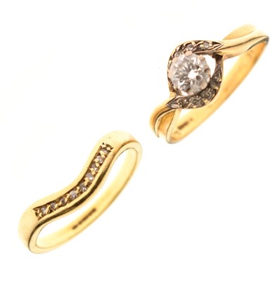 Lot 28 - 18ct gold and diamond solitaire ring and matching wedding ring