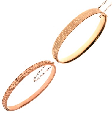 Lot 69 - Edwardian 9ct rose gold snap bangle and 9ct metal core bangle