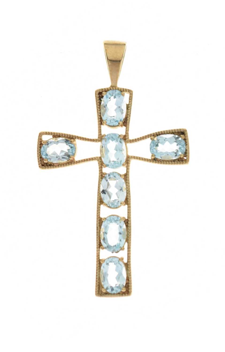 Lot 79 - 9ct gold cross pendant set seven blue topaz stones