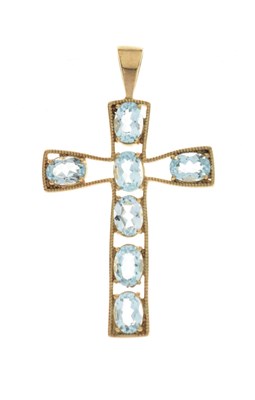 Lot 80 - 9ct gold cross pendant set seven blue topaz stones