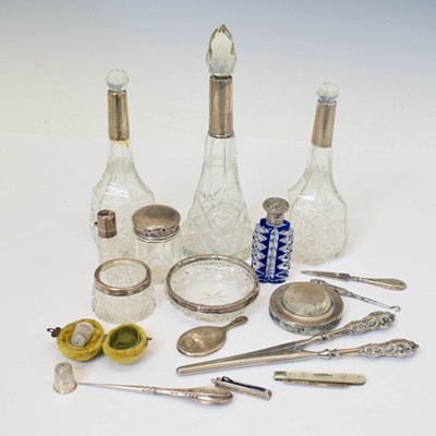 Lot 147 - Quantity of silver items to include a pair of George V silver-mounted bottles, etc