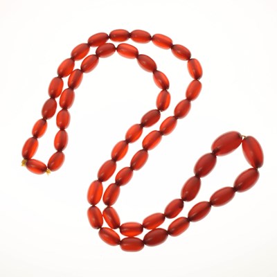 Lot 44 - Cherry Amber Bakelite graduated oval bead necklace