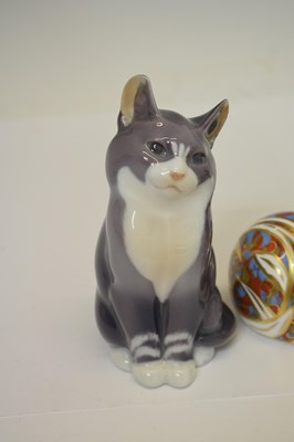 Lot 419 - Three Royal Copenhagen porcelain cats and a Royal Crown Derby cat