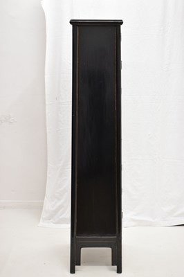 Lot 324 - Chinese black painted tall chest of eight drawers