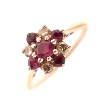 Lot 8 - Ruby and diamond nine-stone cluster ring