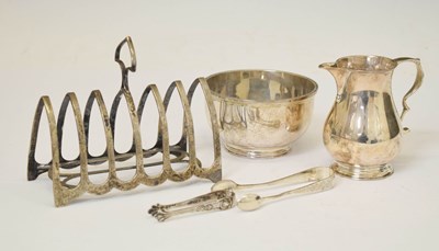 Lot 115 - George V silver toast rack, Elizabeth II silver sugar bowl and milk jug, etc