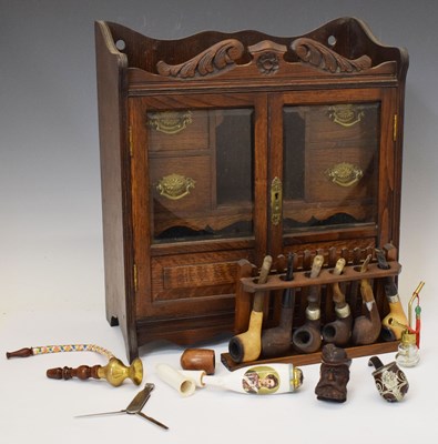 Lot 184 - Edwardian smoker's oak cabinet, and pipes