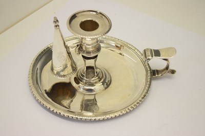 Lot 168 - George III silver chamberstick of circular form with a beaded rim and scroll handle