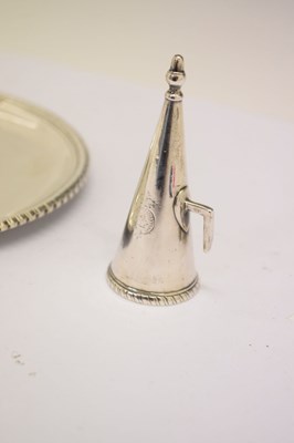 Lot 168 - George III silver chamberstick of circular form with a beaded rim and scroll handle