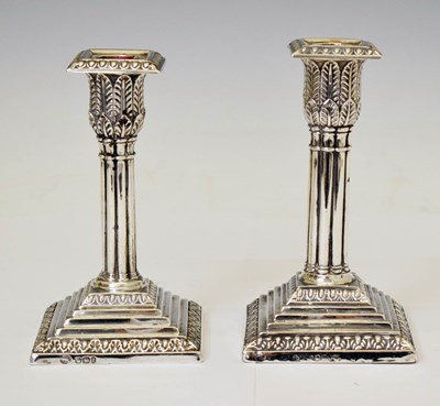 Lot 136 - Matched pair of Victorian silver candlesticks of column design